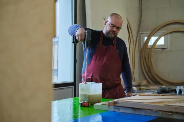 Carpenter using polyester resin.